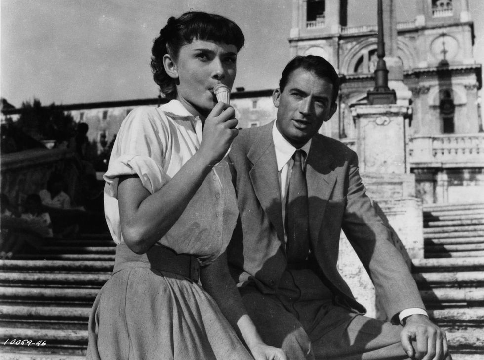 audrey hepburn eats gelato with gregory peck in a scene from the film 'roman holiday', 1953 photo by paramountgetty images