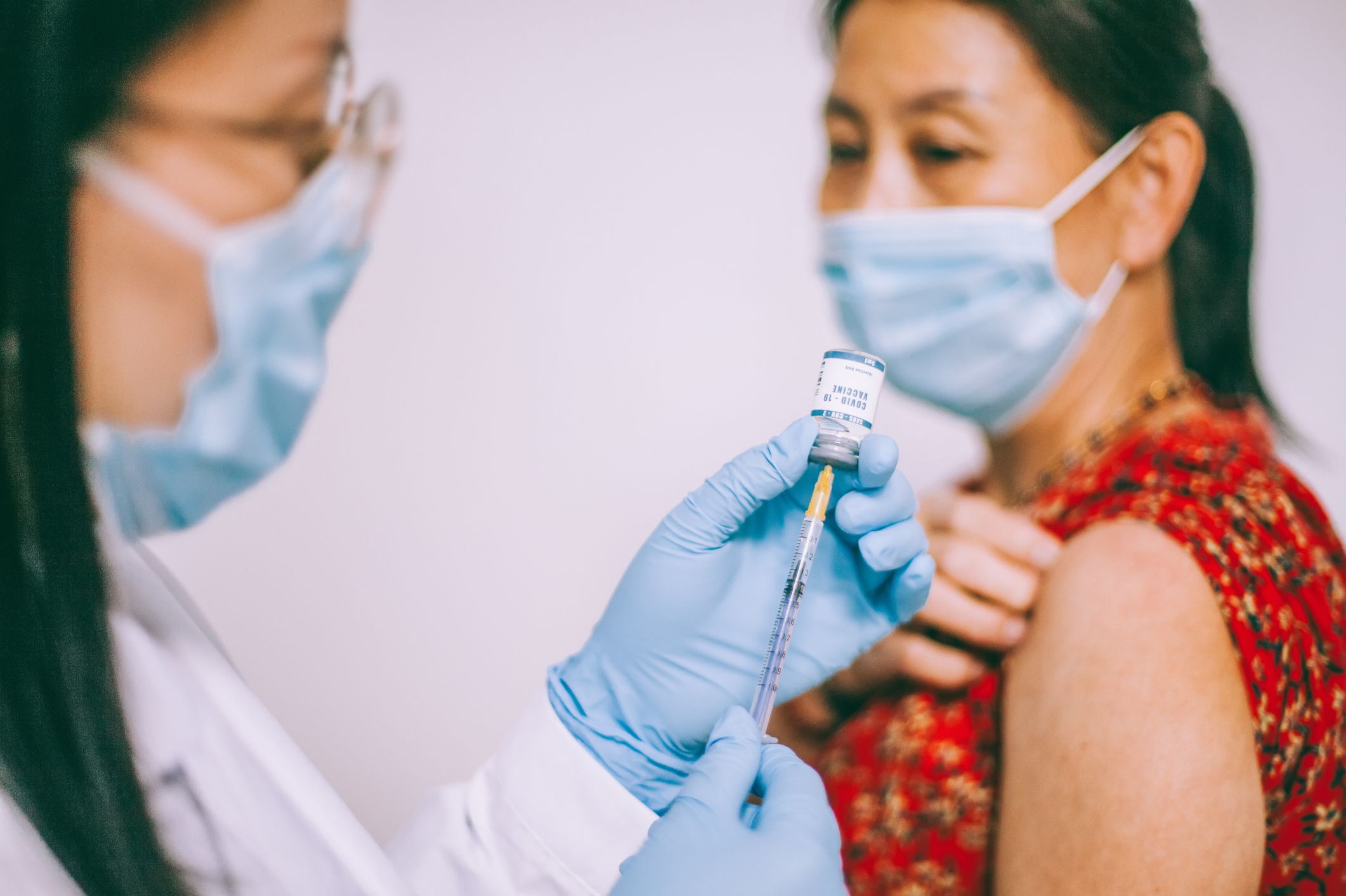 Why Youll Still Need to Wear a Mask After the COVID-19 Vaccine image