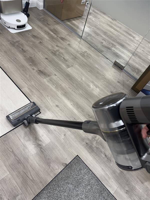 testing a cordless stick vacuum at the good housekeeping institute best vacuums