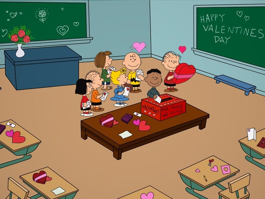 the class distributes valentines in a scene from be my valentine, charlie brown, a good housekeeping pick for best valentine's day movies for kids