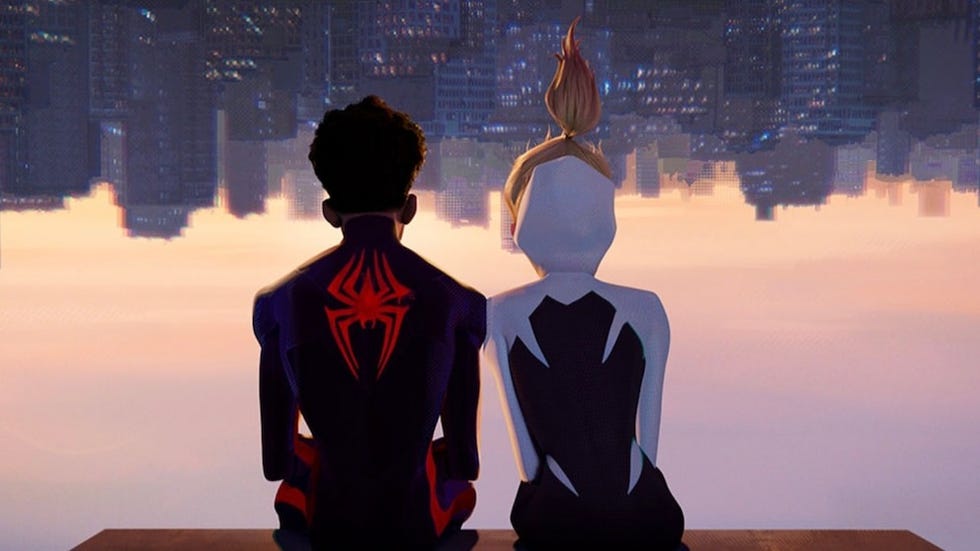 miles morales and gwen stacy sit upside down and watch the skyline in a scene from across the spider verse