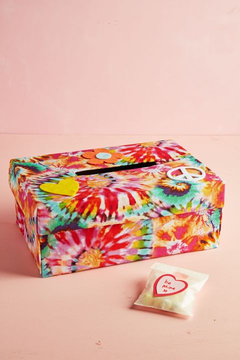 tie dye valentines day box idea wrapped in fabric and decorated wtih felt heart, flower, and peace sign decals