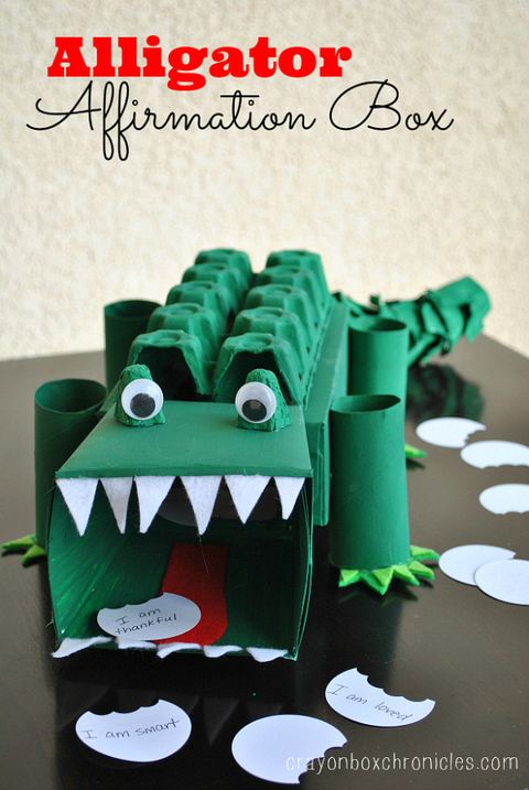 green alligator valentines day box with scales made from upcycled cardbook egg carton and toilet paper roll legs