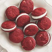 valentines day cookies red velvet sandwich cookies on white plate