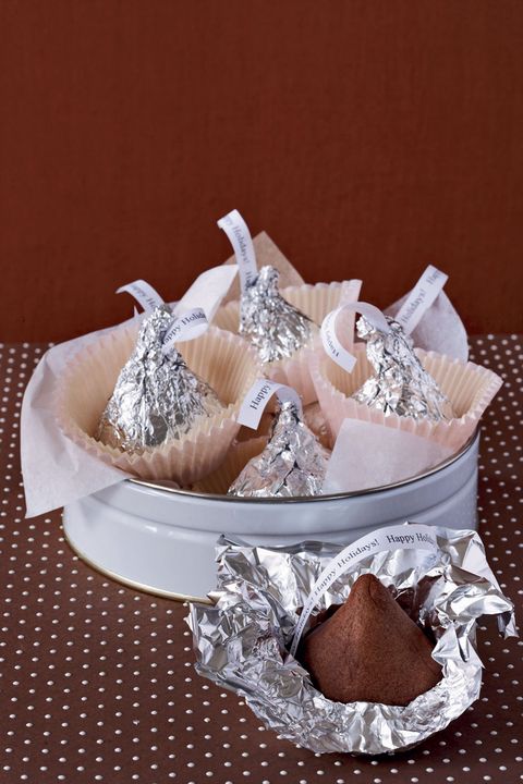 a chocolate hersheys kiss shaped cookie with a foil wrapper