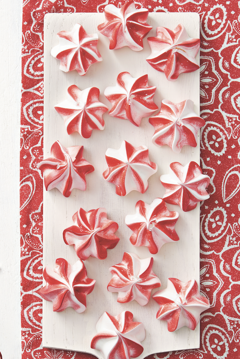 peppermint meringues on white board with red background
