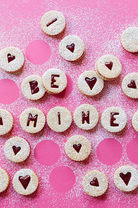 sweet cherry linzer torte cookies that spell out be mine
