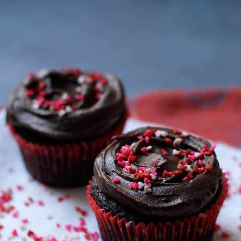 fudgy dark chocolate cupcakes for two with heart sprinkles