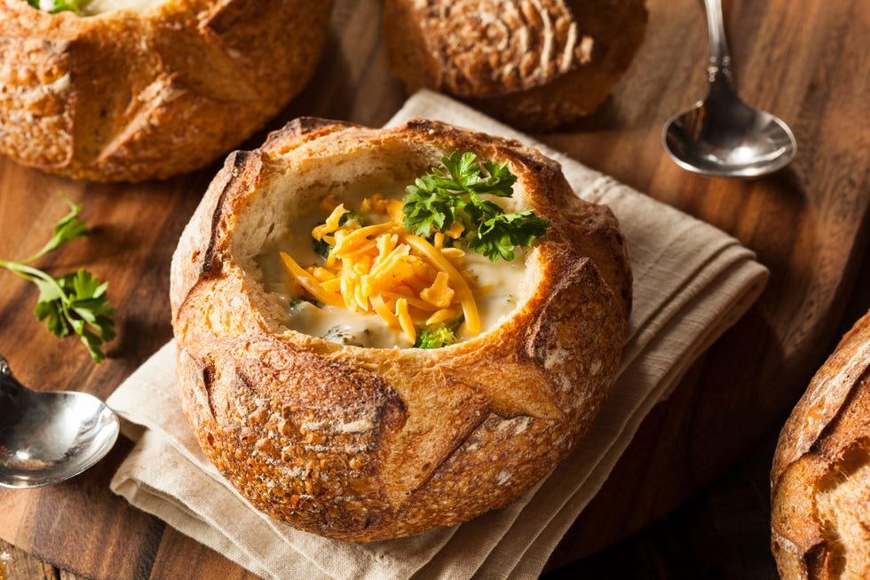 homemade broccoli and cheddar soup in a bread bowl