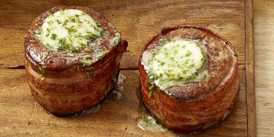 valentines day dinner ideas bacon wrapped filets with butter on wood board