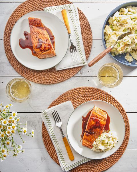 honey garlic salmon with horseradish sour cream mashed potatoes on white plates with green trim