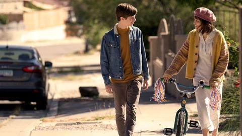 leo and stargirl walk home together in a scene from stargirl, a good housekeeping pick for best valentine's day movies for kids