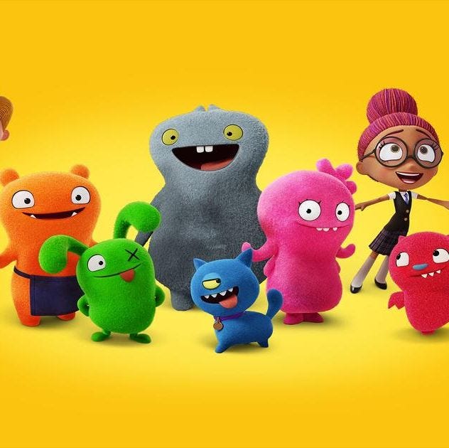 uglydolls and one human line up in a promotional image for uglydolls, a good housekeeping pick for bestvalentine's day movies for kids
