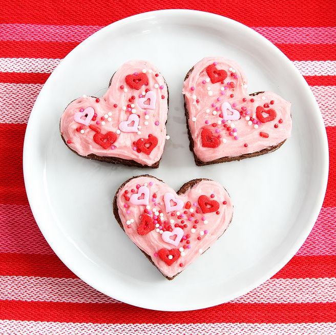 chocolate sugar cookie hearts with pink frosting