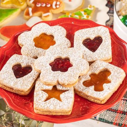 valentines day treats linzer cookies on red plate
