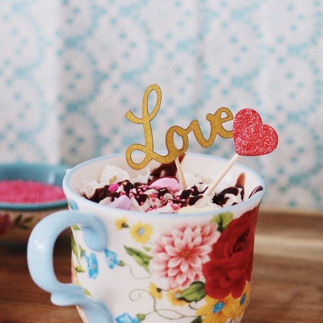 red velvet mug cake with love stick