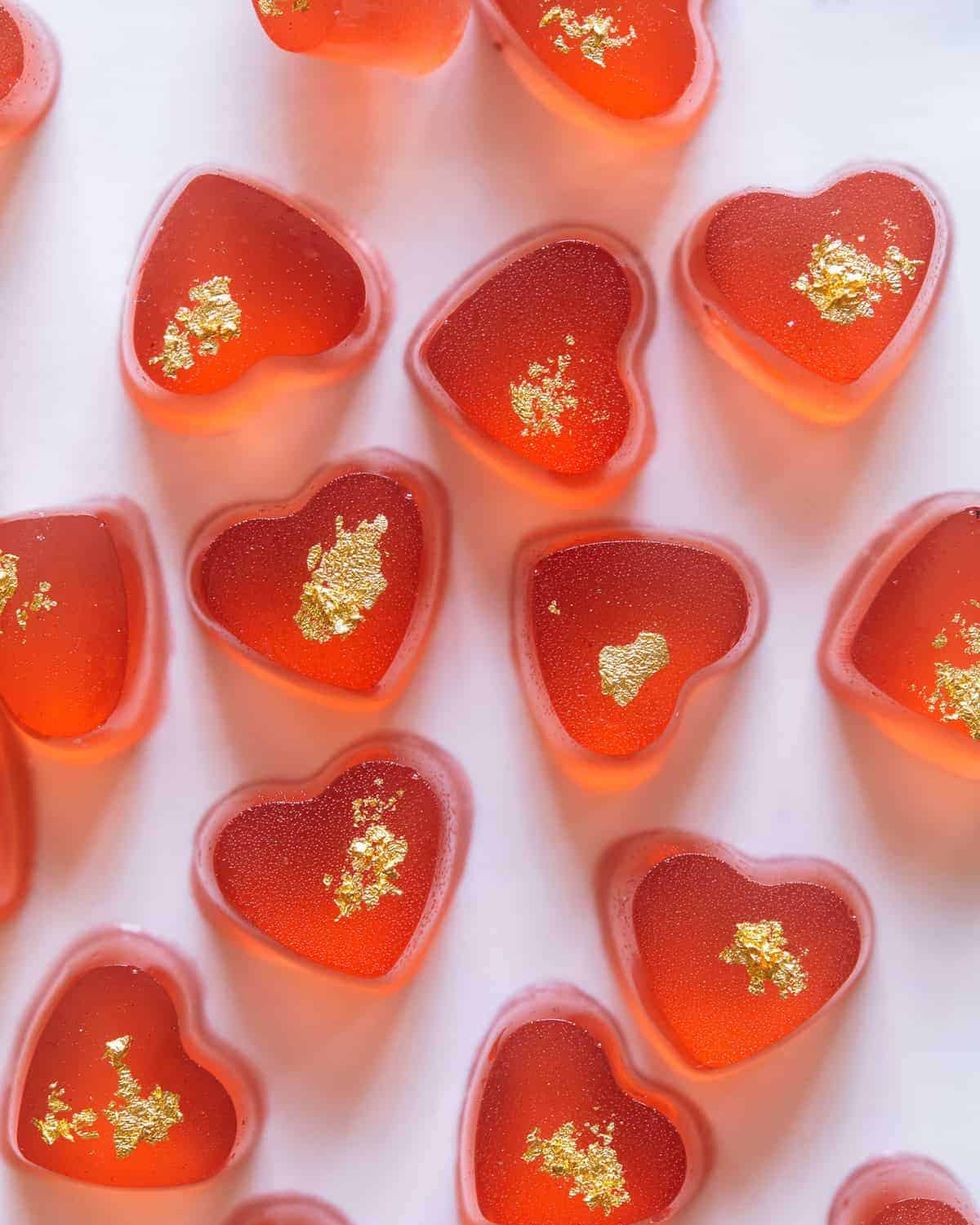 strawberry and sparkling rose gummy hearts with gold topping
