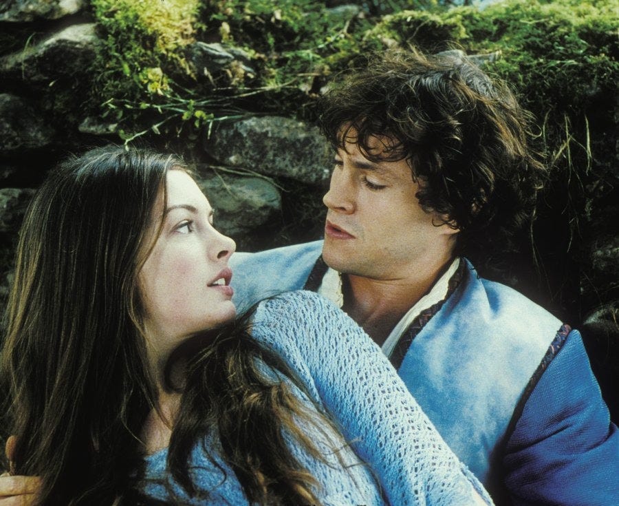 elle and prince char share a fleeting embrace