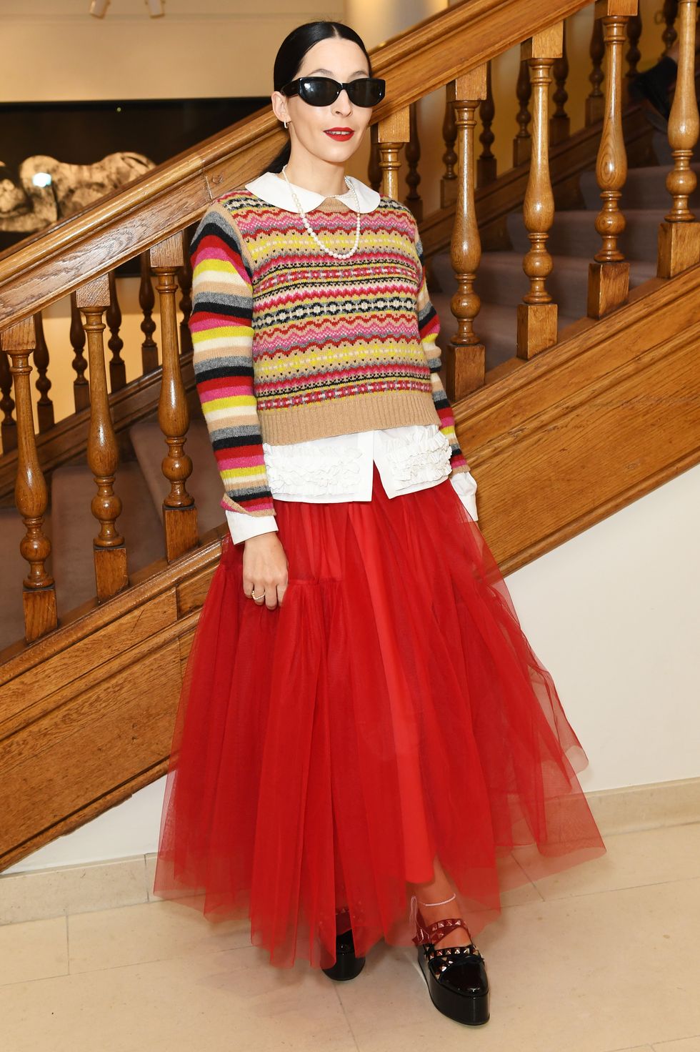 woman wearing a tulle skirt and jumper