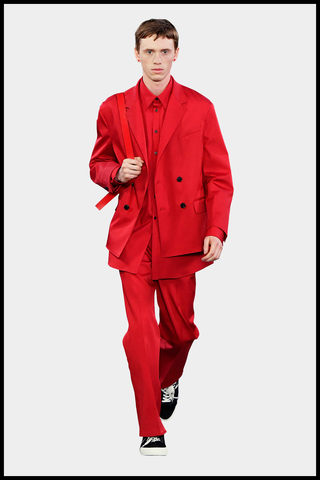 Clothing, Suit, Standing, Red, Outerwear, Formal wear, Sleeve, Coat, Fashion model, Pantsuit, 
