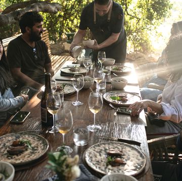 valle de guadalupe, baja california, mexico, guests enjoy a meal at animalon