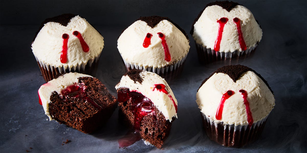 Vampire Cupcakes chocolate cupcakes topped with white icing and red lines