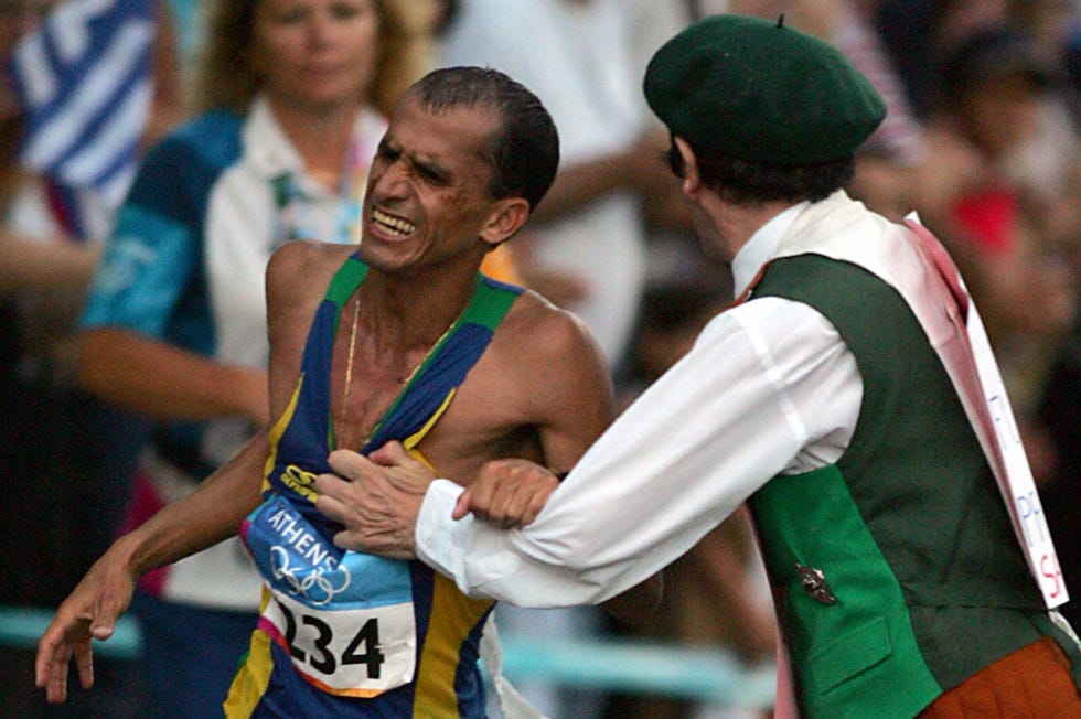 vanderlei lima of brazil is attacked by