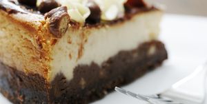 vanilla and chocolate cheesecake with fork