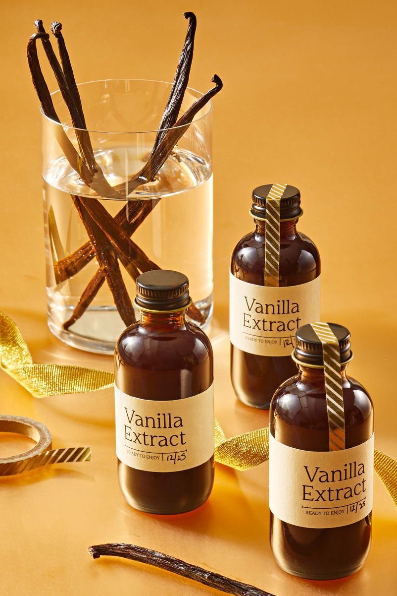 three vanilla extract bottles