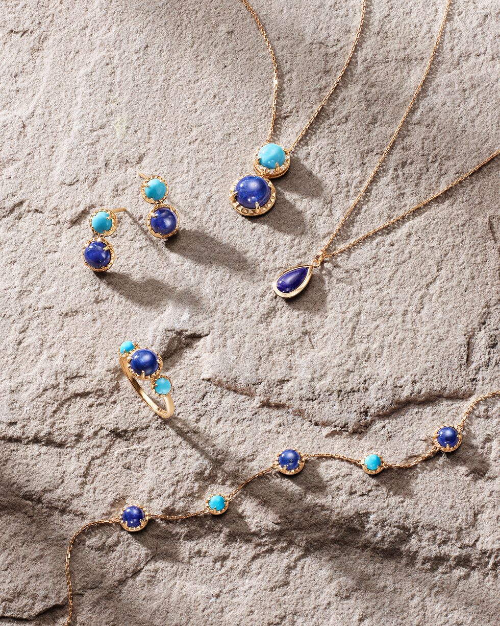 a group of blue beads on a chain