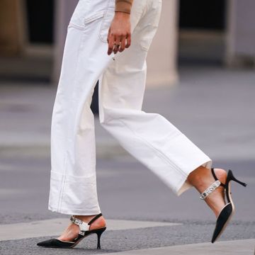 paris, france may 14 a passerby wears white jeans, bejeweled pointy shoes, in the streets of paris, on may 14, 2020 in paris, france photo by edward berthelotgetty images