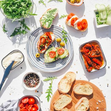 a variety of healthy toasts with vegetables, seeds and microgreens