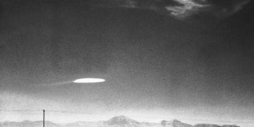 ufo flying over new mexico in black and white image