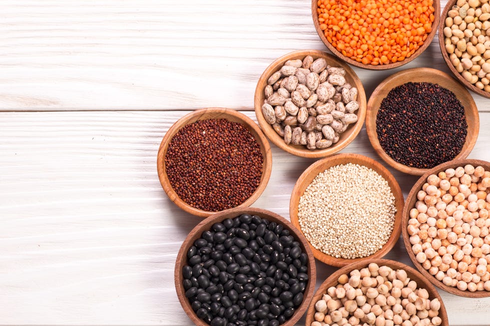various legumes on wooden background,healthy food,vegan food.