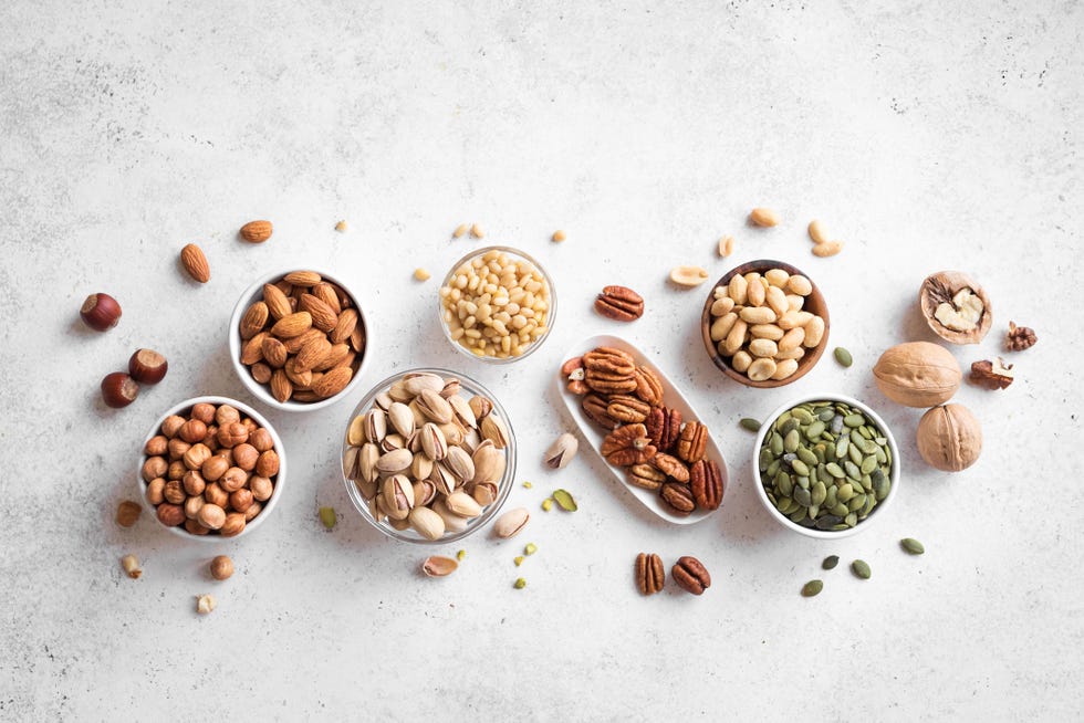 various nuts in  bowls