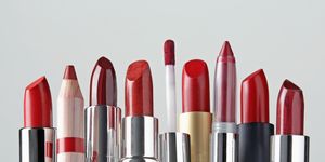 various red lipsticks lined upin a row