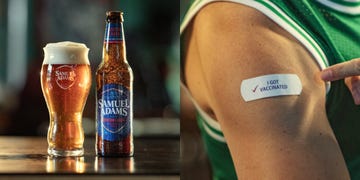 sam adams beer and a vaccine band aid on a guy's arm