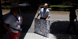 an anti vaccine rally protester dressed up as joe biden holds a sign outside of houston methodist hospital in houston, texas, on june 26, 2021   a spokesperson for houston methodist hospital said on june 23, 153 employees either resign or were fired for refusing to be vaccinated photo by mark felix  afp photo by mark felixafp afp via getty images