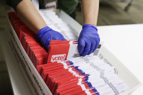 election workers sort vote by mail ballots for the presidential primary at king county elections in renton, washington on march 10, 2020 photo by jason redmond  afp photo by jason redmondafp via getty images
