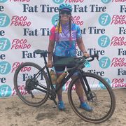 vega brhely with her bike after the fat tire foco fondo