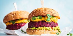 vegan beetroot burger with sweet potato sauce and guacamole plant based diet concept