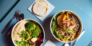 Vegan bowls with various vegetables and seeds, high angle view