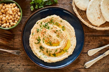 foods with zinc, vegan food, plate with hummus ready to serve