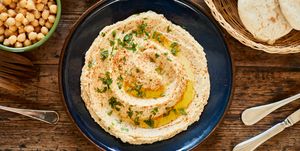 foods with zinc, vegan food, plate with hummus ready to serve