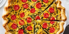vegan quiche topped with cherry tomatoes