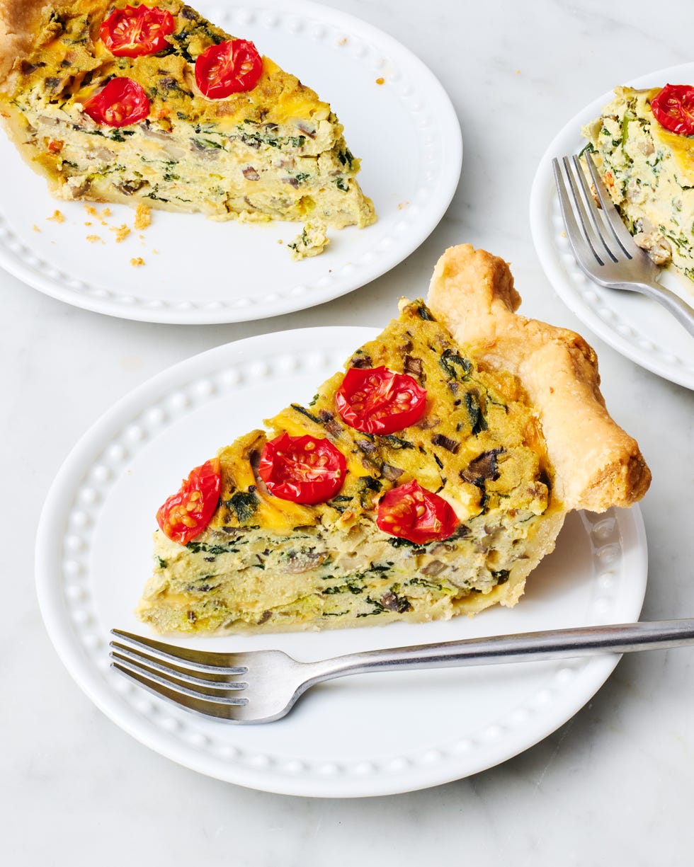 vegan quiche topped with cherry tomatoes