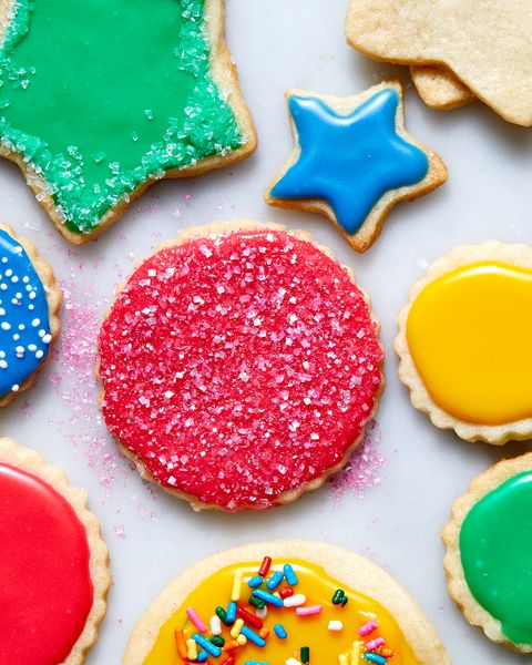 vegan sugar cookies iced and topped with sprinkles