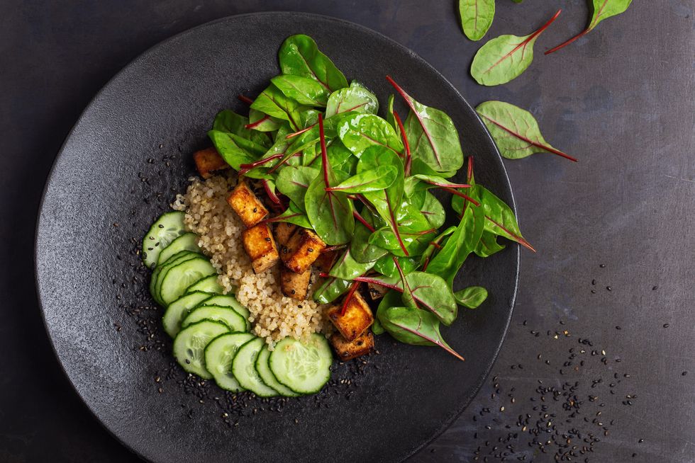 vegan tofu poke bowl with baby chard and quinoa