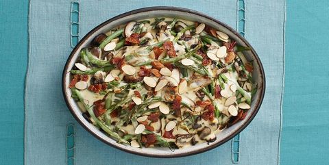 green bean mushroom casserole with candied bacon on teal surface