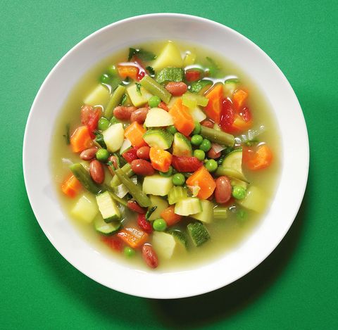 vegetable soup on a green backdrop